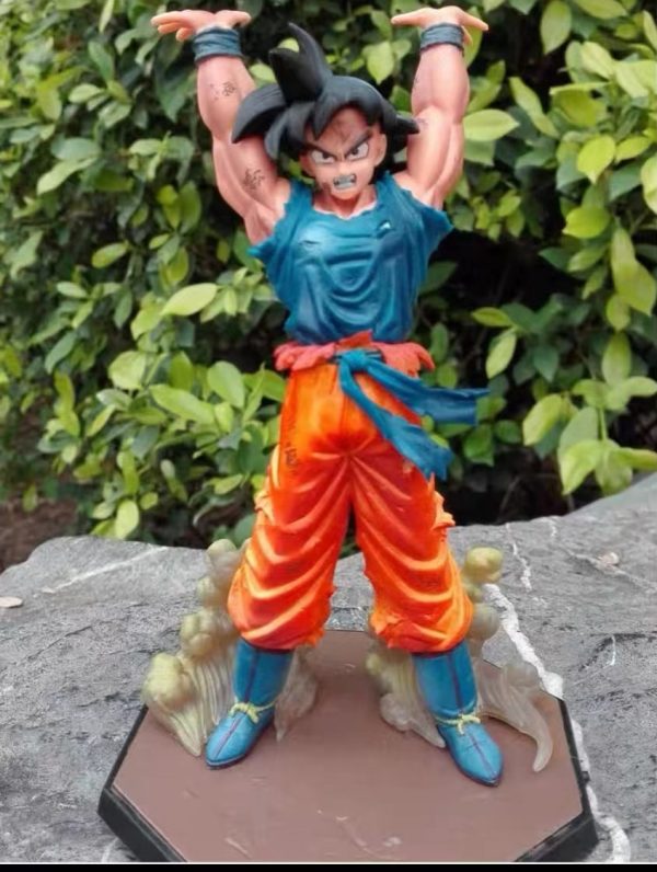 Muñeco Colección Goku Haciendo la Genkidama